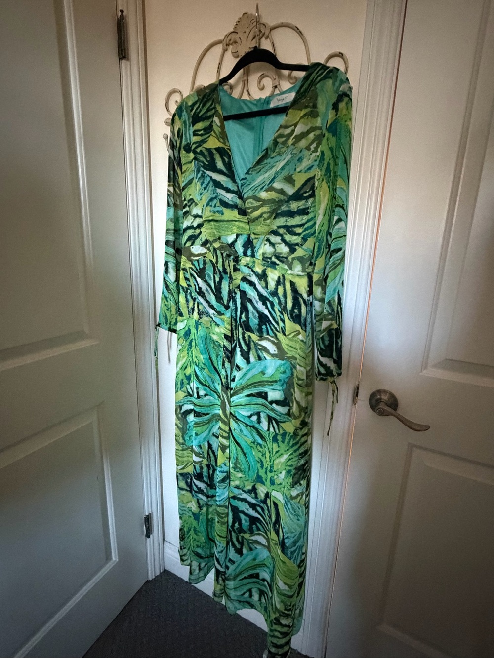 Vibrant Flowy Green Patterned Wrap Maxi Dress with shorts.